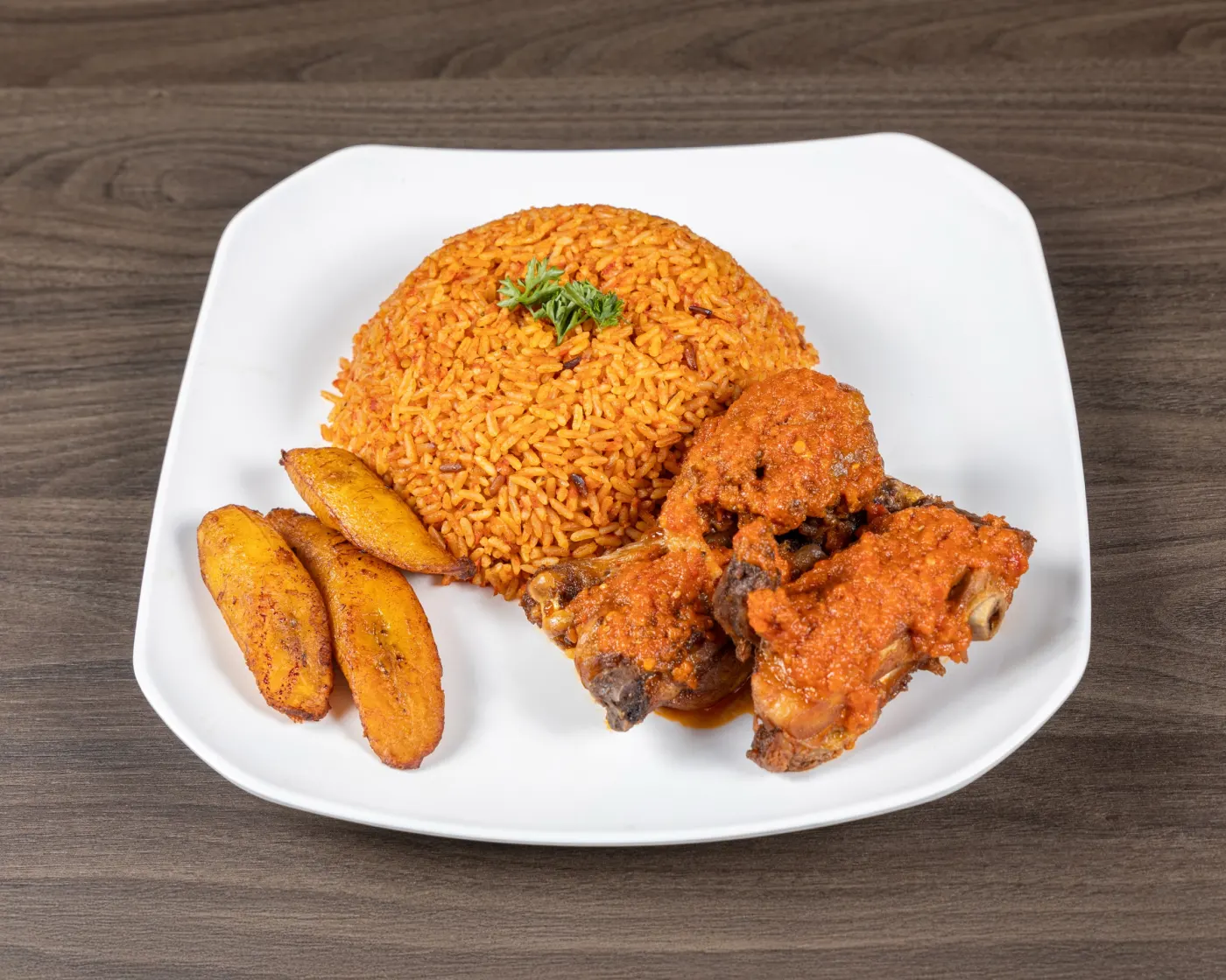 Jollof rice with chicken and fried plantain