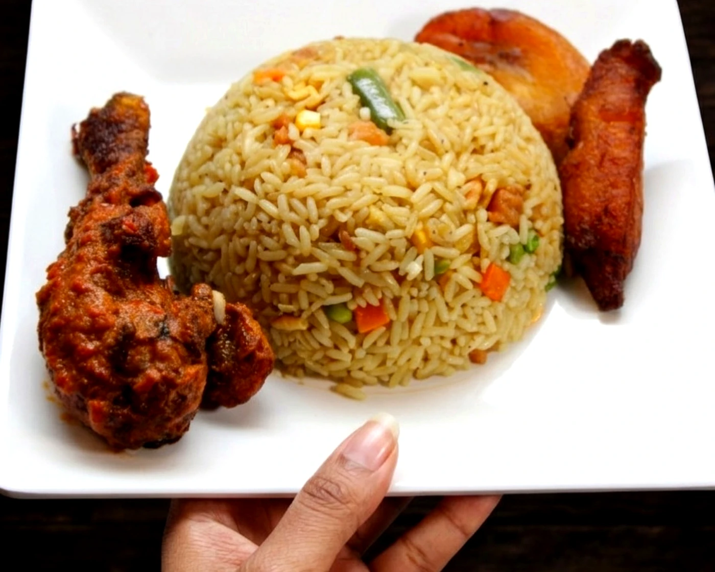 Owanbe jollof rice with chicken and plantains